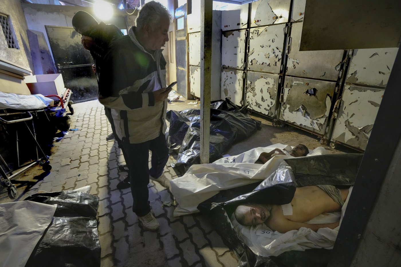 Syrians flock to morgues looking for loved ones who perished in Assad's prisons | iNFOnews.ca Syrians flock to morgues looking for loved ones who perished in Assad's prisons | iNFOnews.ca