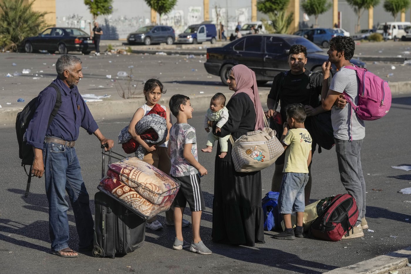 Hundreds of fleeing families sleep on beaches and streets after Israel's strikes shake Beirut | iNFOnews.ca Hundreds of fleeing families sleep on beaches and streets after Israel's strikes shake Beirut | iNFOnews.ca