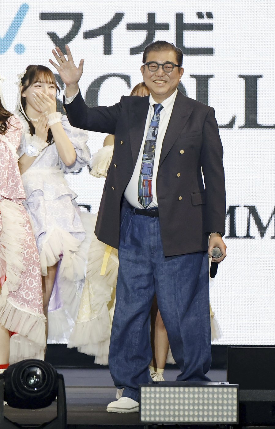 Japan's PM admits to being 'extremely nervous' as he swaps functionality for style at fashion show | iNFOnews.ca
