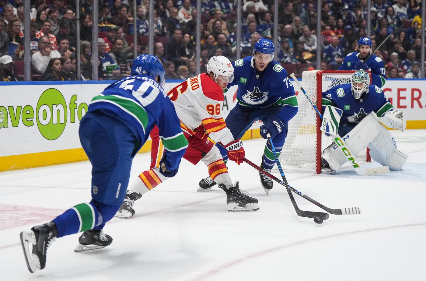 Calgary Flames battle back to defeat Vancouver Canucks 6-5 in overtime | iNFOnews.ca