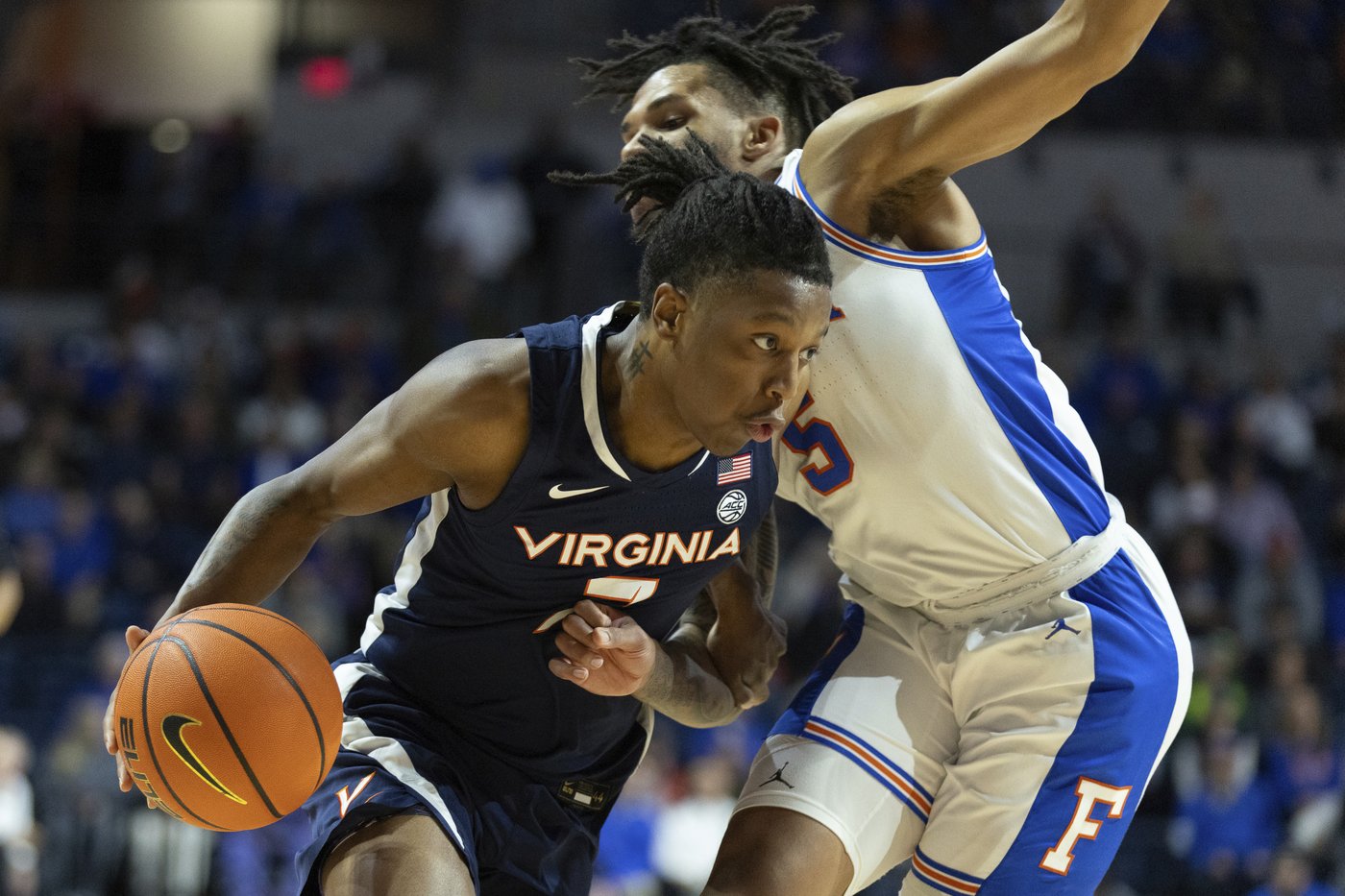 Walter Clayton scores 27 points, No. 13 Florida beats Virginia 87-69 in SEC/ACC Challenge | iNFOnews.ca Walter Clayton scores 27 points, No. 13 Florida beats Virginia 87-69 in SEC/ACC Challenge | iNFOnews.ca