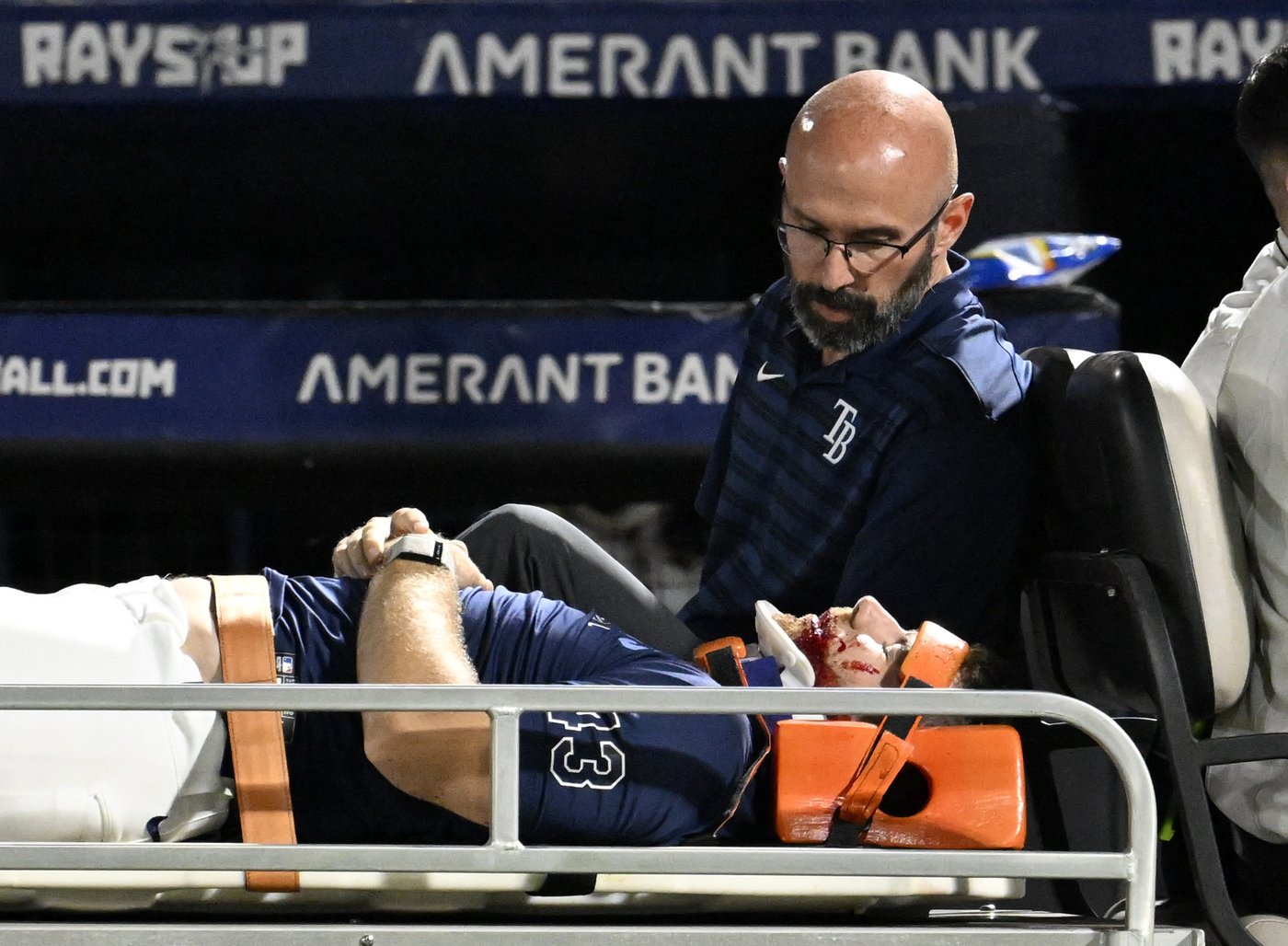 Rays pitcher carted off field and taken to hospital after foul ball into dugout hits him in face | iNFOnews.ca Rays pitcher carted off field and taken to hospital after foul ball into dugout hits him in face | iNFOnews.ca