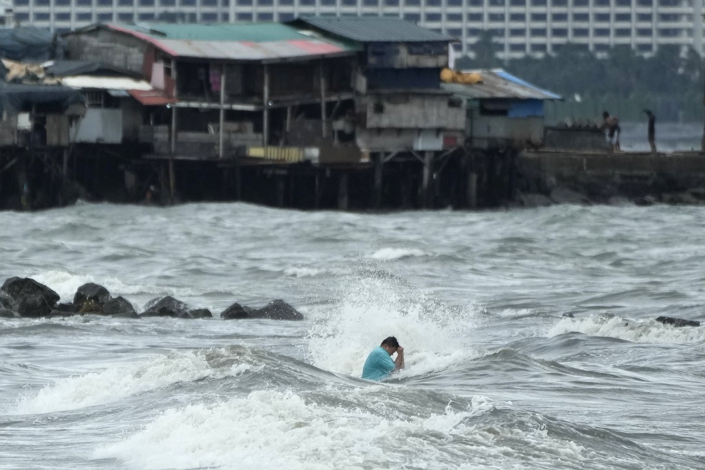 Floods in Philippines kill at least 9 and trap others on roofs as storm approaches | iNFOnews.ca Floods in Philippines kill at least 9 and trap others on roofs as storm approaches | iNFOnews.ca