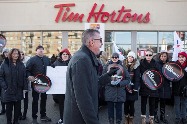 'Hold the sugar, hold the cream, Tim Hortons don't be mean,' protesters chant | iNFOnews.ca