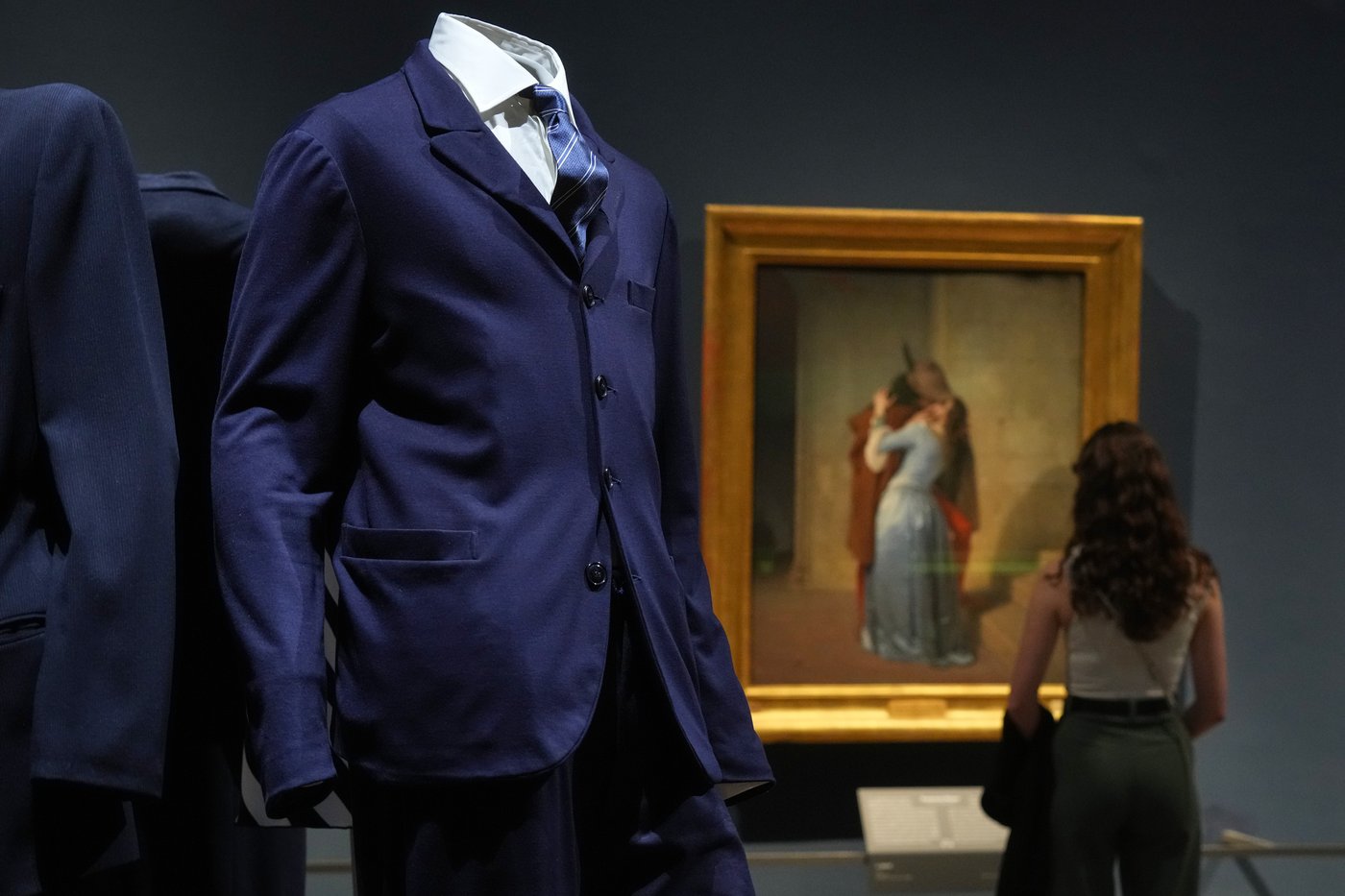 Giorgio Armani's sartorial creations interplay with Italian masterpieces at Milan museum exhibition | iNFOnews.ca