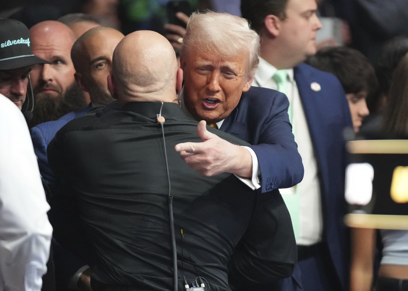 Trump sits cageside at Miami UFC event in his latest appearance at a sports event | iNFOnews.ca Trump sits cageside at Miami UFC event in his latest appearance at a sports event | iNFOnews.ca