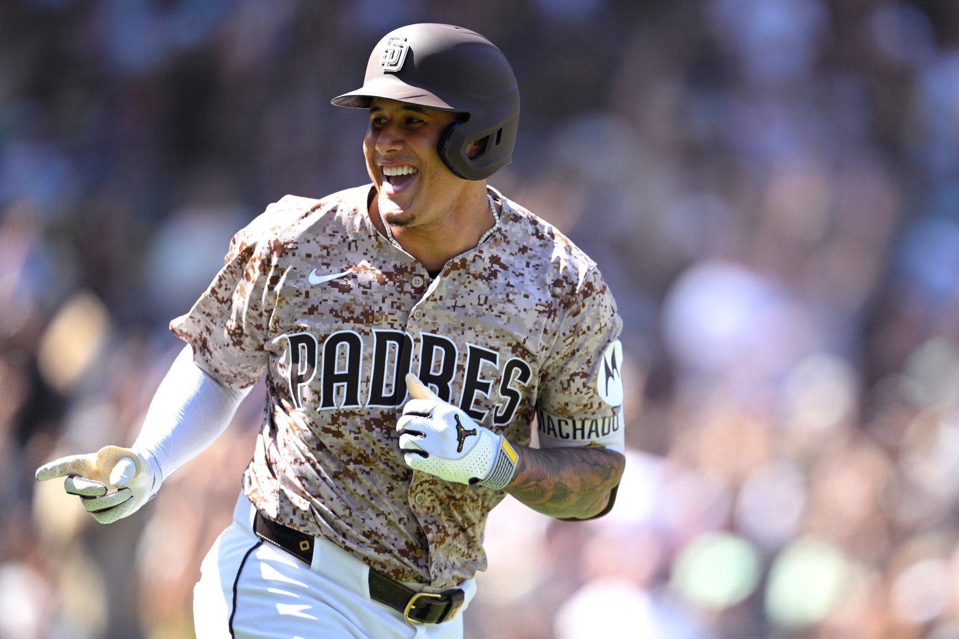 Machado, Padres head into postseason after beating Diamondbacks 12-4 for 3-game sweep | iNFOnews.ca