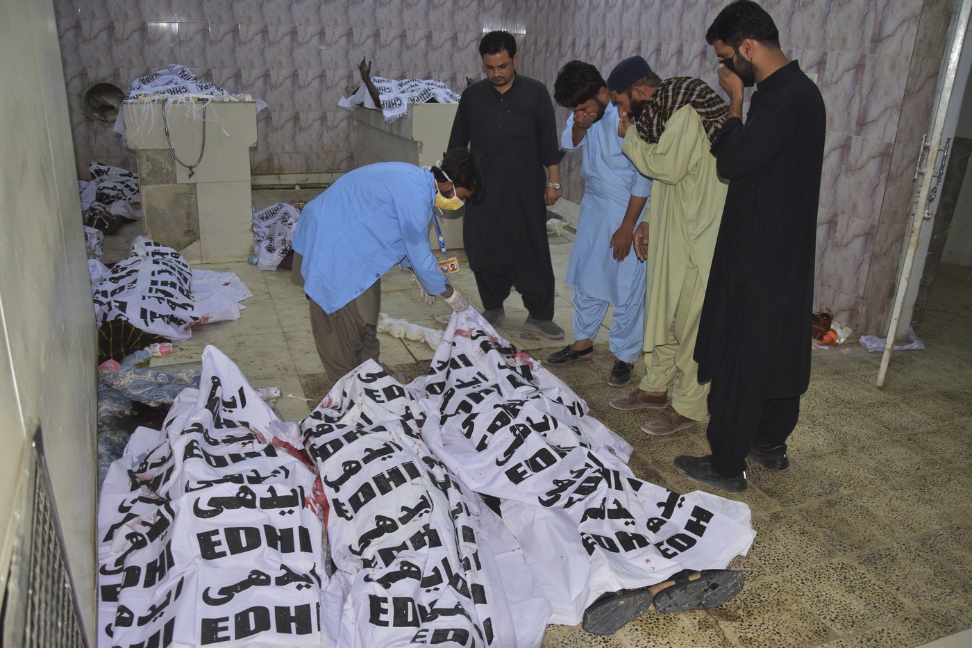 A suicide bombing near a political rally in southwestern Pakistan kills 13 and wounds 30 | iNFOnews.ca