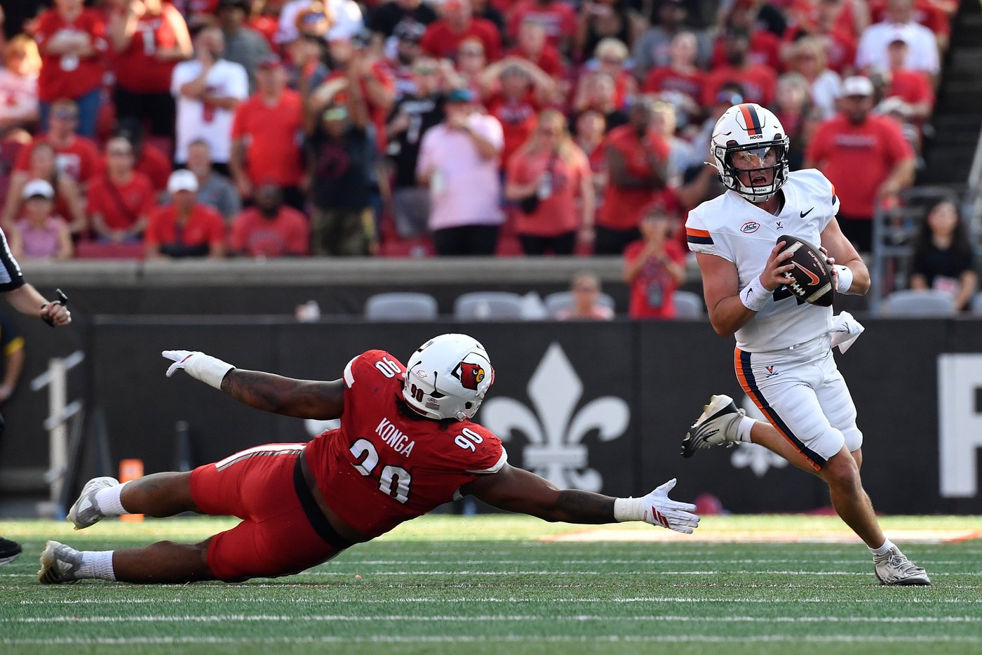 Taylor's OT run lifts No. 24 Virginia to a 30-27 victory over Louisville | iNFOnews.ca Taylor's OT run lifts No. 24 Virginia to a 30-27 victory over Louisville | iNFOnews.ca