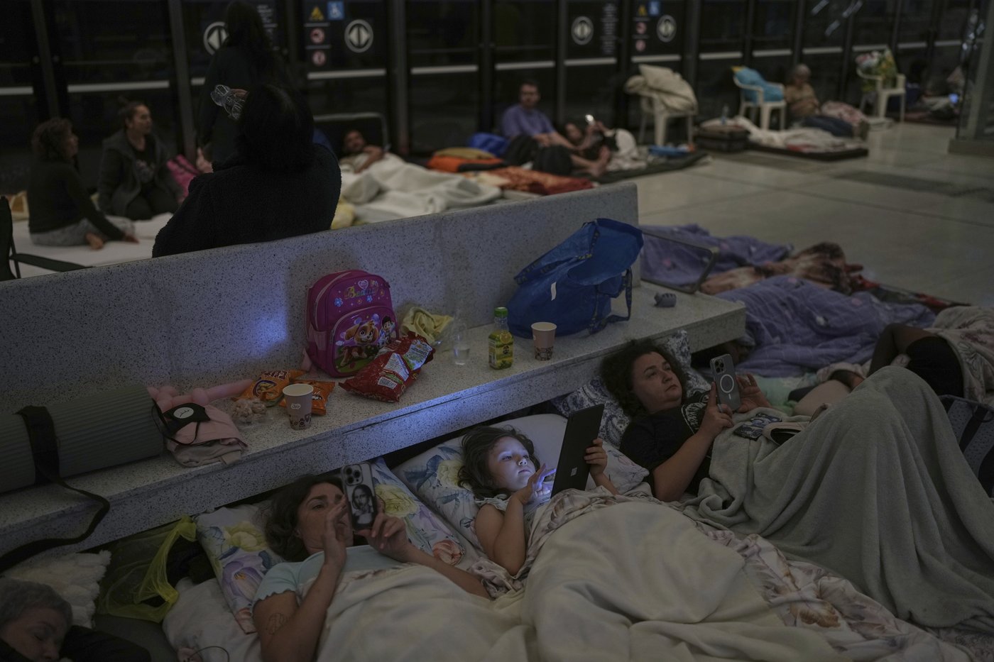 Fearful of Iranian missiles, many sleep in Israel's underground train stations | iNFOnews.ca Fearful of Iranian missiles, many sleep in Israel's underground train stations | iNFOnews.ca