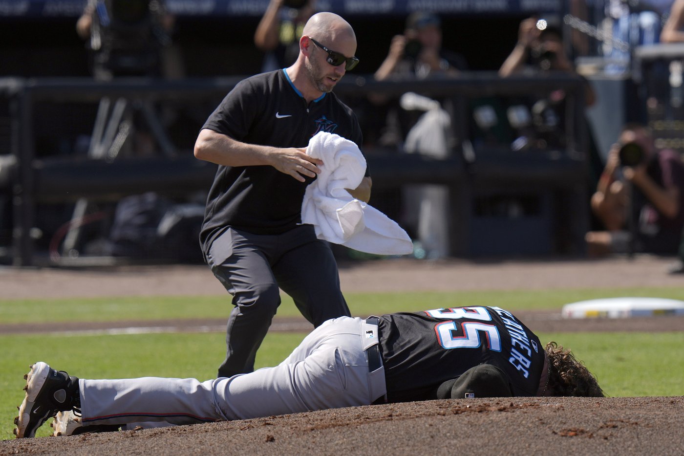 Marlins starter Ryan Weathers pitches 3 innings after getting hit in the head by catcher's throw | iNFOnews.ca
