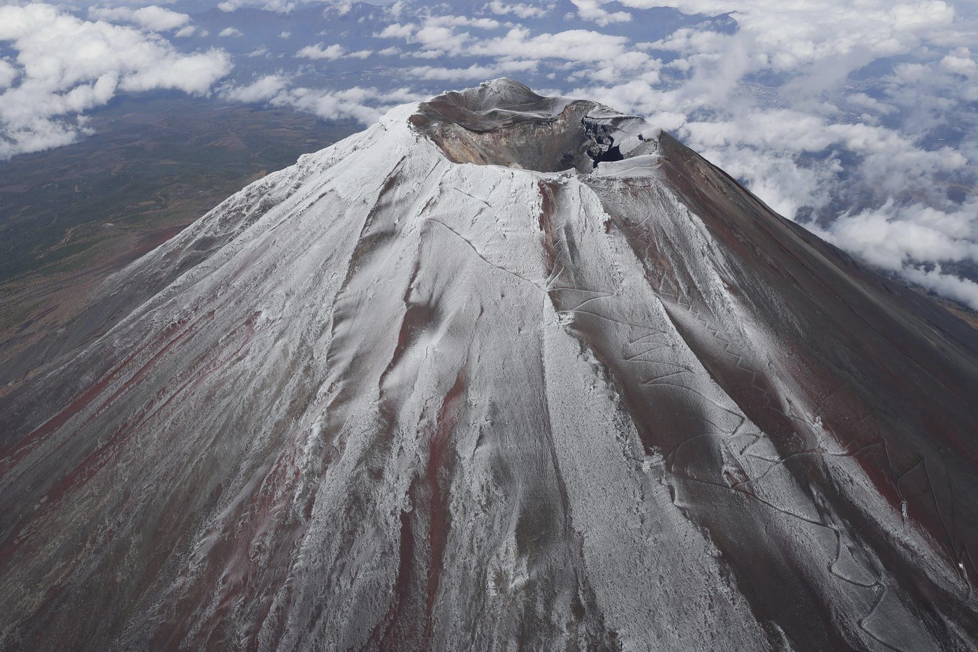 It's not official yet but Mount Fuji gets its trademark snowcap after the longest delay in 130 years | iNFOnews.ca It's not official yet but Mount Fuji gets its trademark snowcap after the longest delay in 130 years | iNFOnews.ca