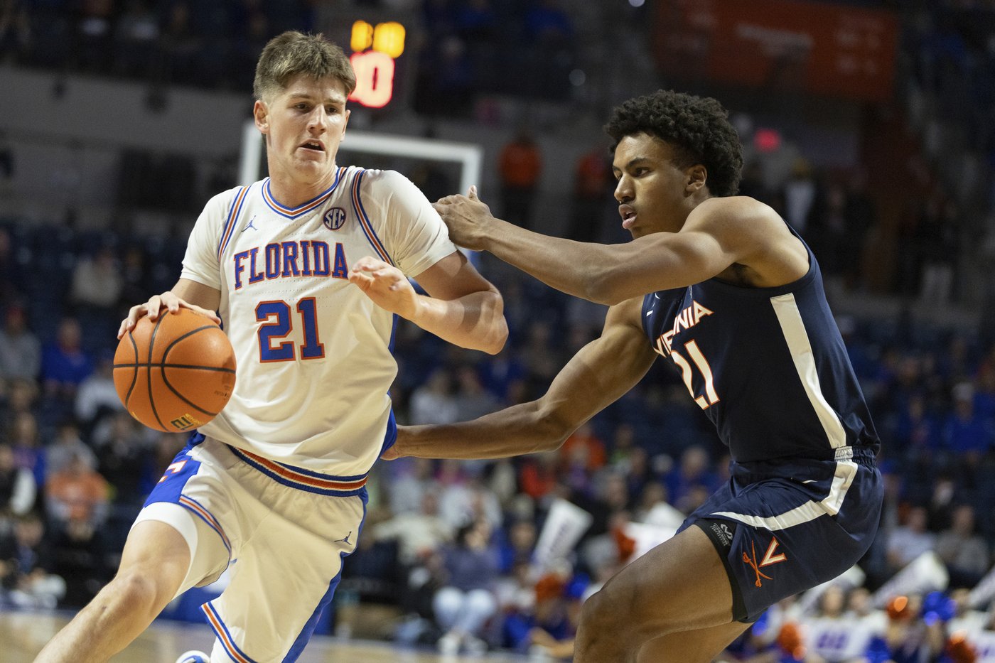 Walter Clayton scores 27 points, No. 13 Florida beats Virginia 87-69 in SEC/ACC Challenge | iNFOnews.ca Walter Clayton scores 27 points, No. 13 Florida beats Virginia 87-69 in SEC/ACC Challenge | iNFOnews.ca
