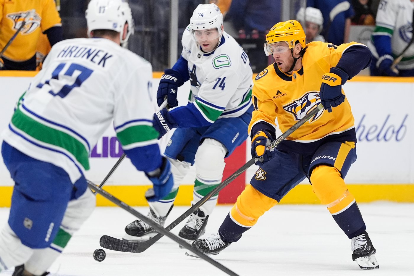 Boeser scores late OT winner as Canucks beat pesky Predators 5-4 | iNFOnews.ca
