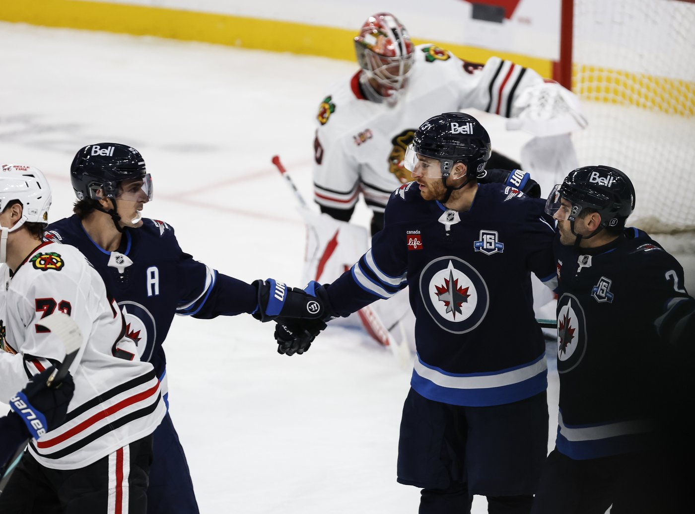 Jets' top line each produce three-point efforts in 6-3 win over Blackhawks | iNFOnews.ca