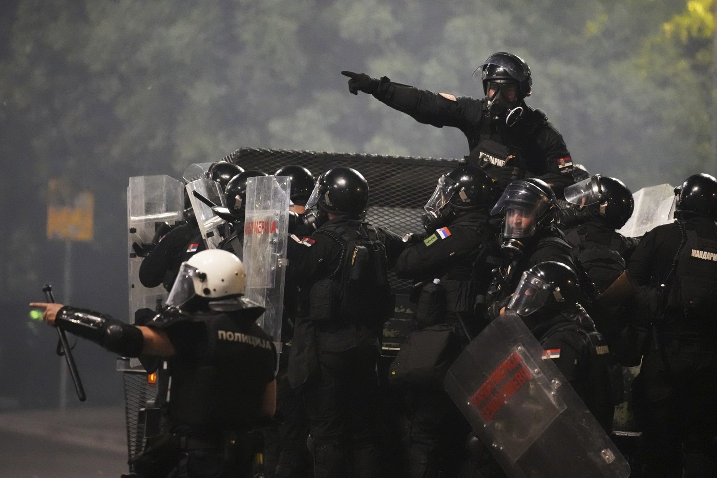 Tensions soar in Serbia as angry protesters clash with police, set fire to party offices | iNFOnews.ca