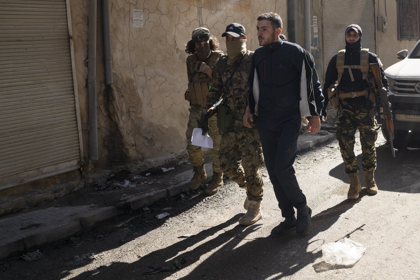 AP PHOTOS: Syria's new security forces conduct sweeps in Homs, looking for ousted Assad's loyalists | iNFOnews.ca