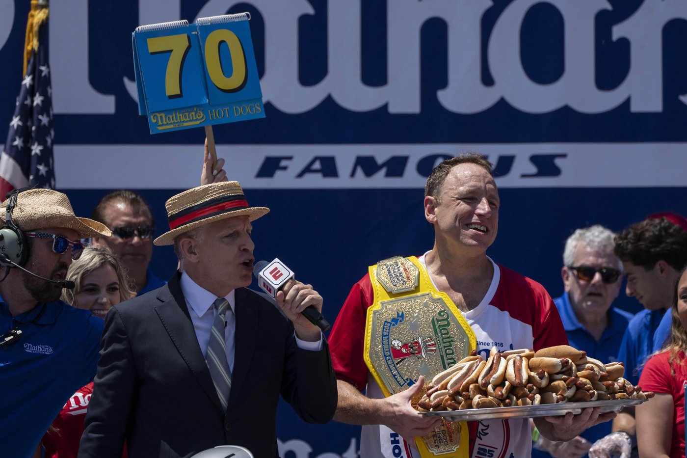 Joey Chestnut reclaims title in Nathan's Famous hot dog eating contest, wins 17th Mustard Belt | iNFOnews.ca Joey Chestnut reclaims title in Nathan's Famous hot dog eating contest, wins 17th Mustard Belt | iNFOnews.ca
