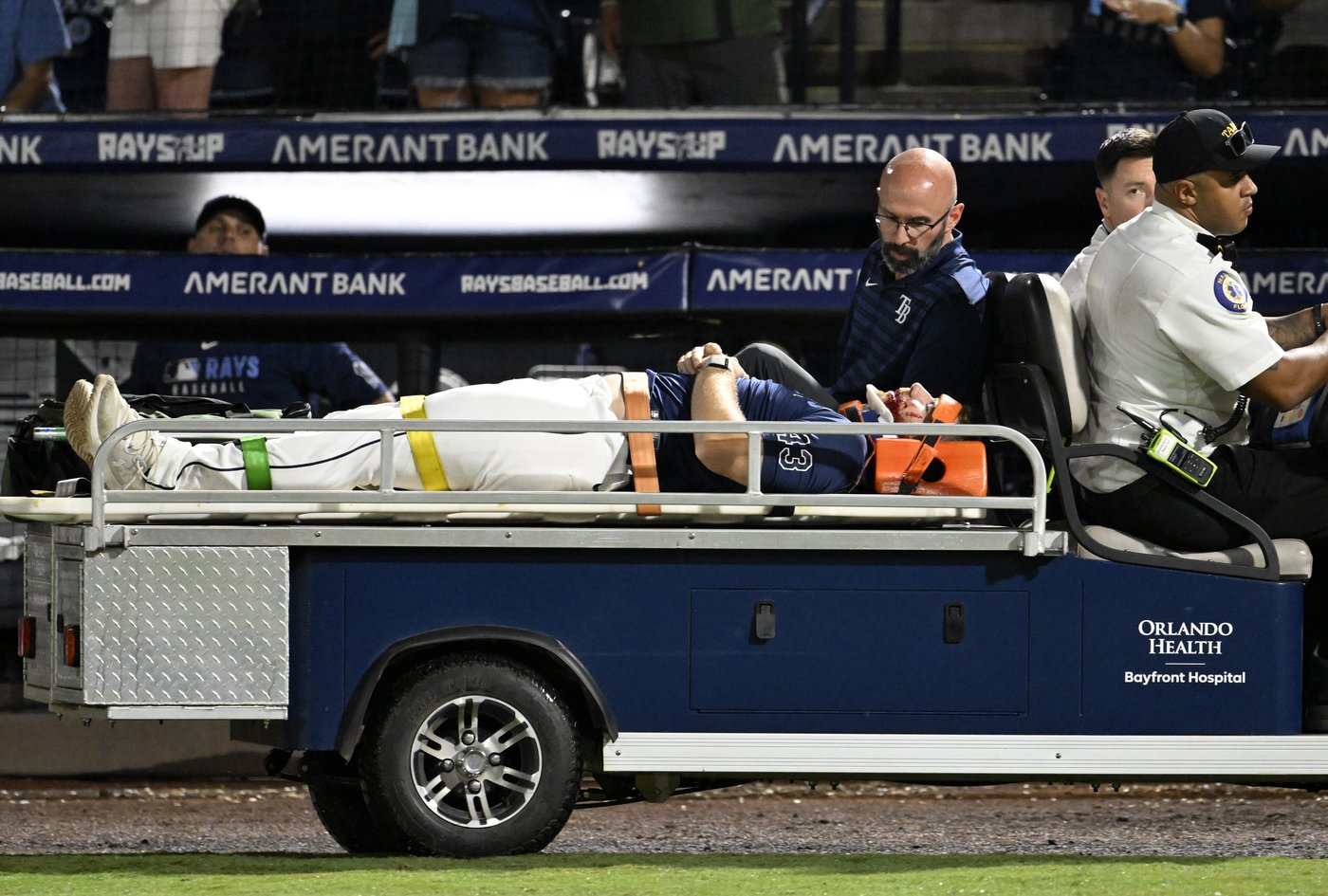 Rays pitcher carted off field and taken to hospital after foul ball into dugout hits him in face | iNFOnews.ca Rays pitcher carted off field and taken to hospital after foul ball into dugout hits him in face | iNFOnews.ca