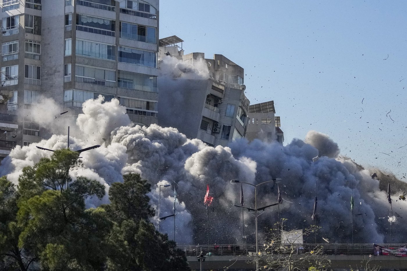 AP PHOTOS: An AP photographer captures a bomb falling on a building in his childhood neighborhood | iNFOnews.ca