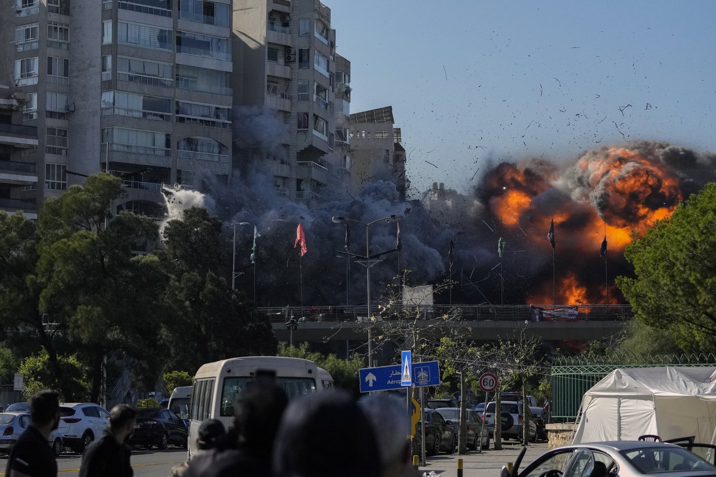 AP PHOTOS: An AP photographer captures a bomb falling on a building in his childhood neighborhood | iNFOnews.ca