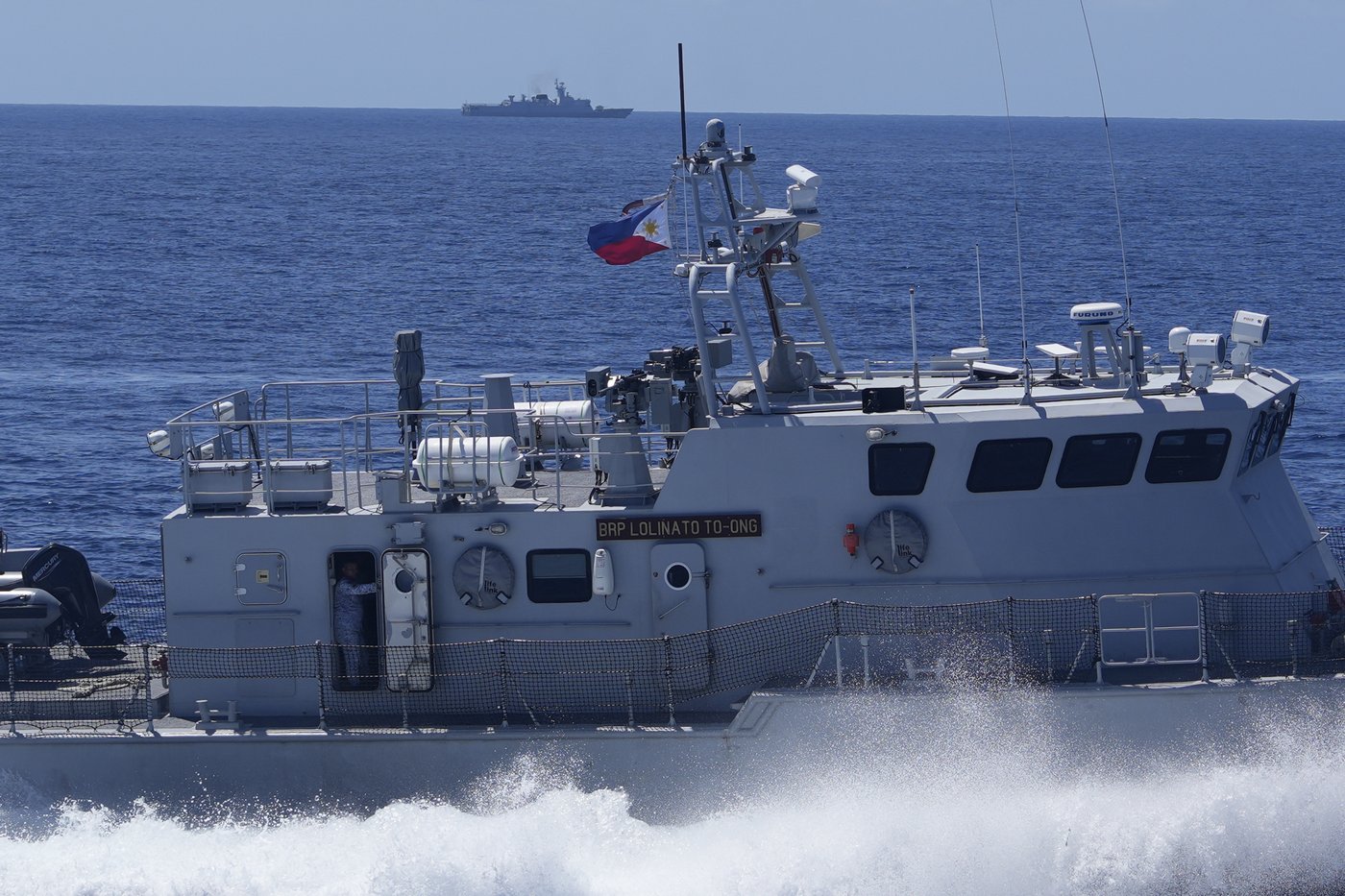 Philippine forces retake an island in mock combat as China's navy watches | iNFOnews.ca