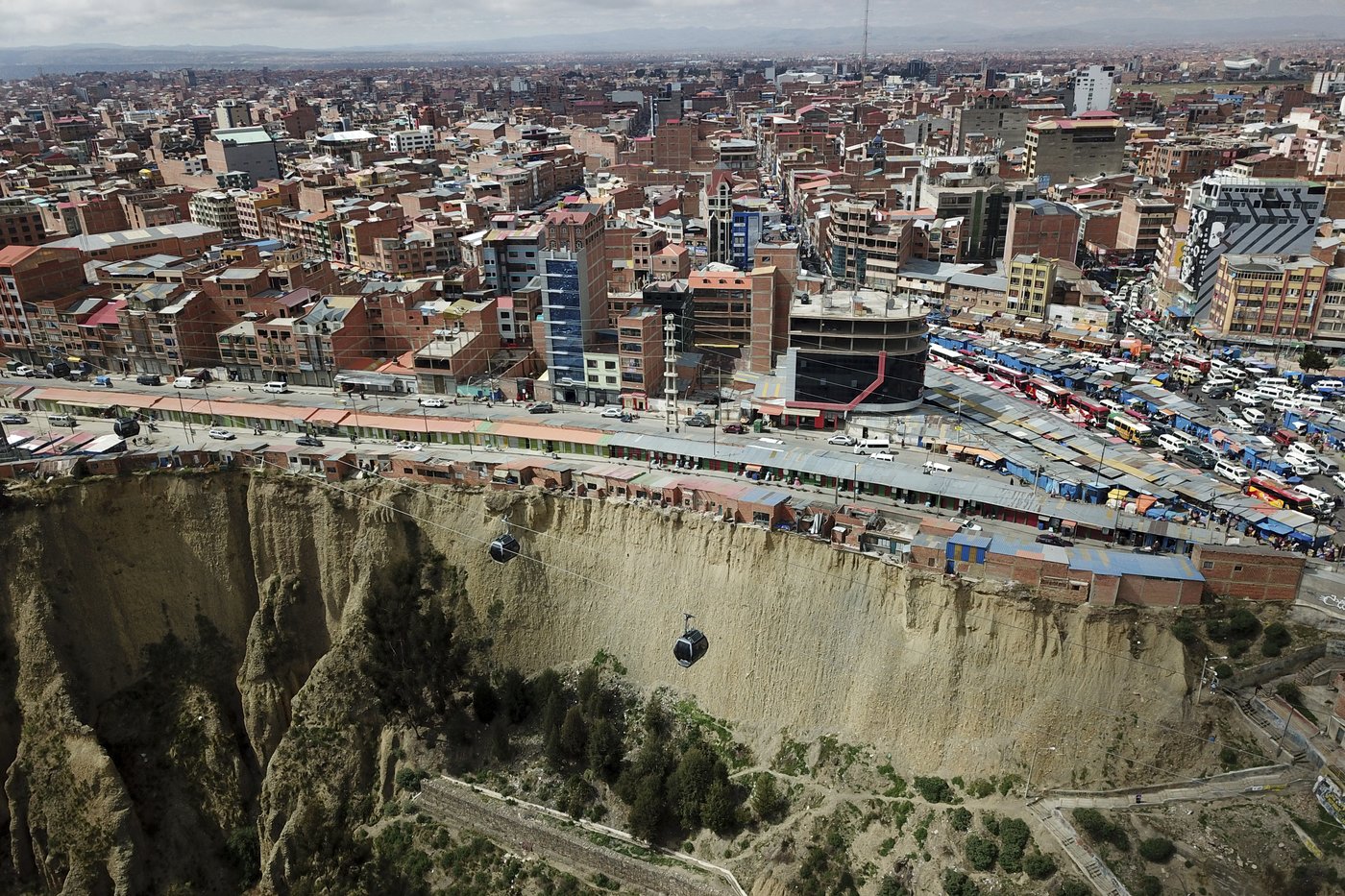 Shamans refuse to evacuate precarious cliff-top shacks in Bolivia despite government order | iNFOnews.ca Shamans refuse to evacuate precarious cliff-top shacks in Bolivia despite government order | iNFOnews.ca