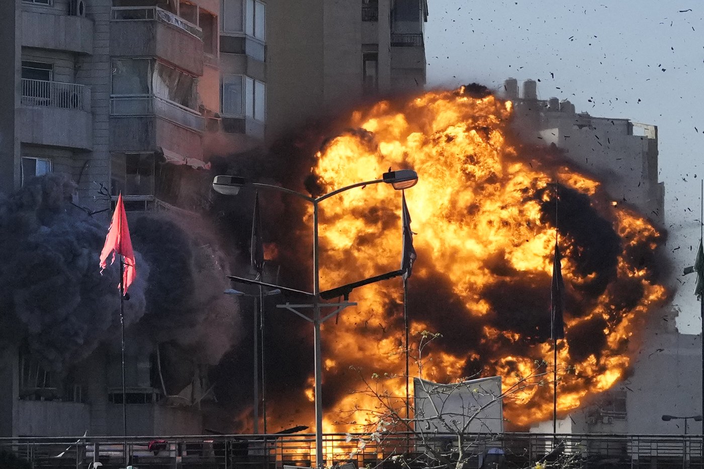 AP PHOTOS: An AP photographer captures a bomb falling on a building in his childhood neighborhood | iNFOnews.ca