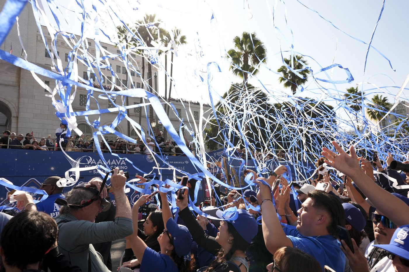 Shohei Ohtani brings his dog and addresses crowd in English as Dodgers celebrate World Series title | iNFOnews.ca