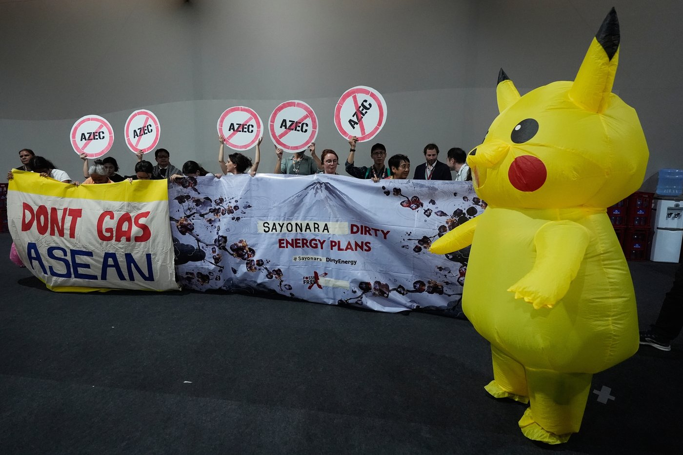 Protesters in Pikachu costumes demand Japan end fossil fuel financing at UN climate conference | iNFOnews.ca