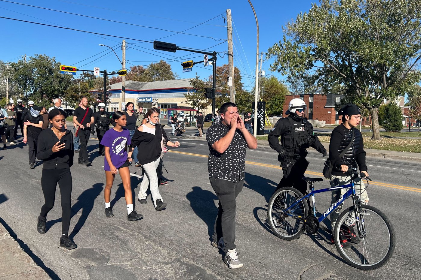 Protesters demand body cameras after fatal shooting of 15-year-old Nooran Rezayi | iNFOnews.ca