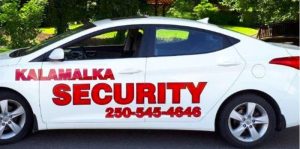 White car stencilled with company name in red letters