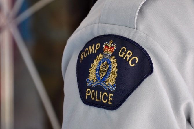 Kamloops woman arrested after stolen vehicle crashes | iNFOnews.ca A police officer's shoulder with the RCMP logo on it.