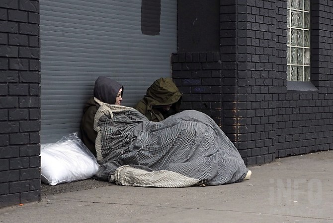 Deaths of homeless people on the rise in Interior Health region | iNFOnews.ca A phot of two homeless people huddled together under blanket.