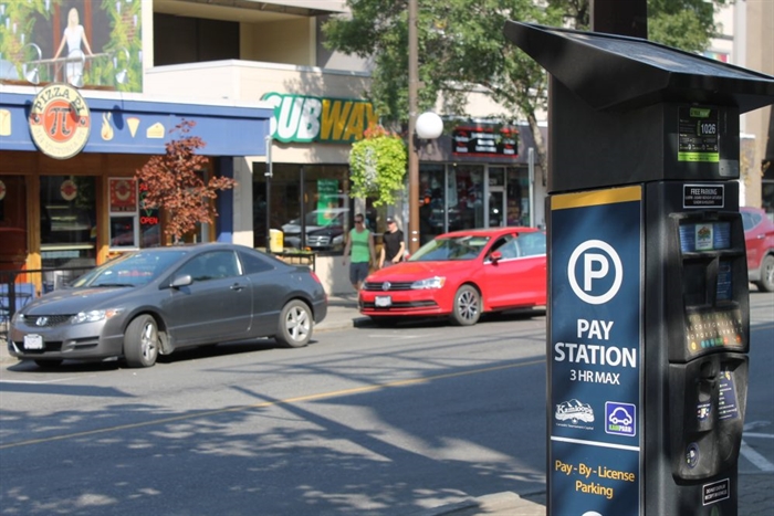 Six months of outstanding Kamloops parking fines nears $80,000 | iNFOnews.ca A downtown street with an electronic parking metre in the foreground.