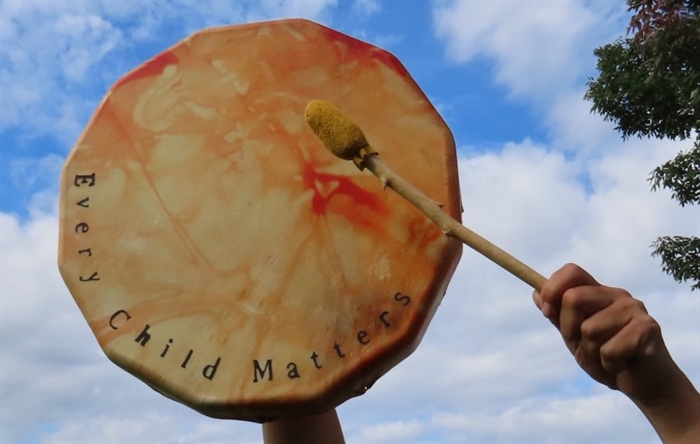 What to do for Truth and Reconciliation Day in Kamloops, Okanagan | iNFOnews.ca Someone hitting a drum that says every child matters.