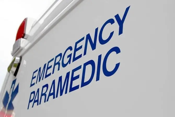 "Emergency Paramedic" captured on the side of an ambulance.