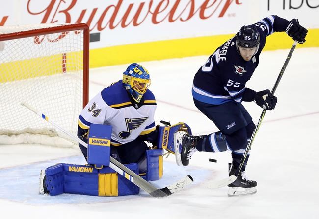 Connor Hellebuyck with 24 saves, Jets blank Blues to split home-and-home set | iNFOnews.ca